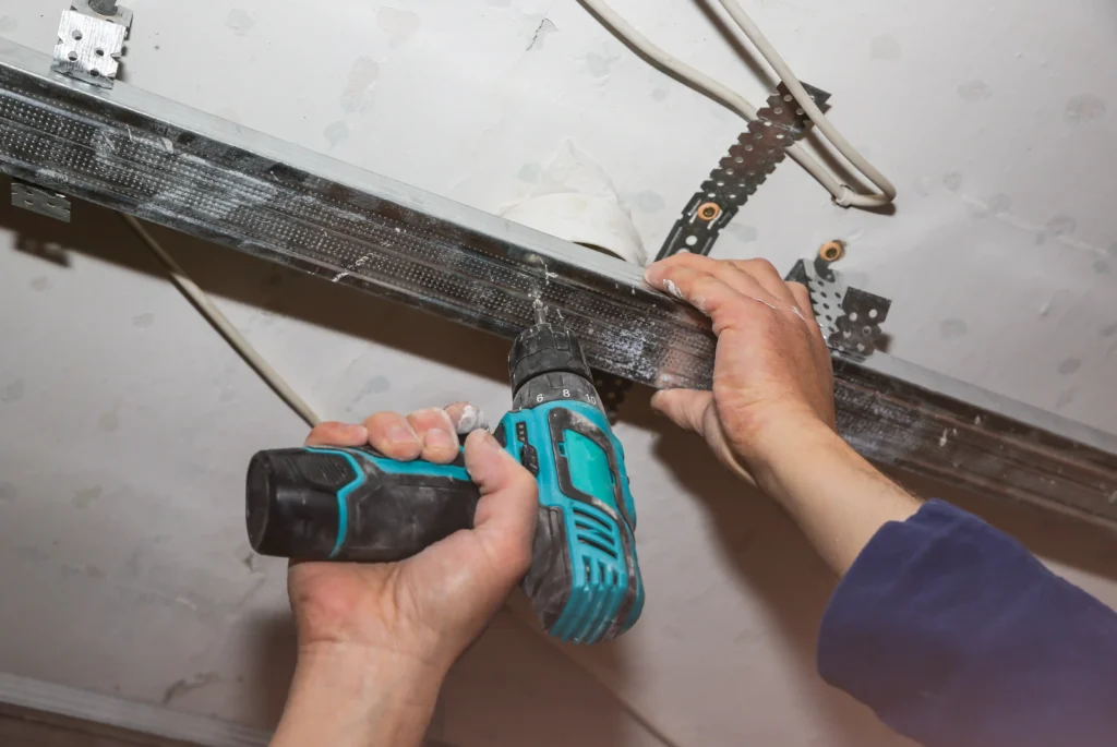 stretch ceiling metal constructions man in using 2026 03 26 04 00 23 utc